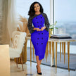 Dotted Long-Sleeve Knee-Length Dress with Fitted Silhouette and Button Accents