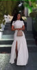 White maxi A-line dress with high slit and short sleeves