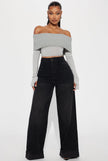 Black high-waist wide-leg jeans with cuff detail, belt loops, and zip fly
