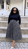 Pleated midi skirt, black with white speckled pattern and adjustable waist