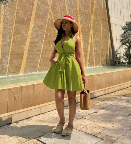 Lime green sleeveless A-line dress with tie waist and flared skirt