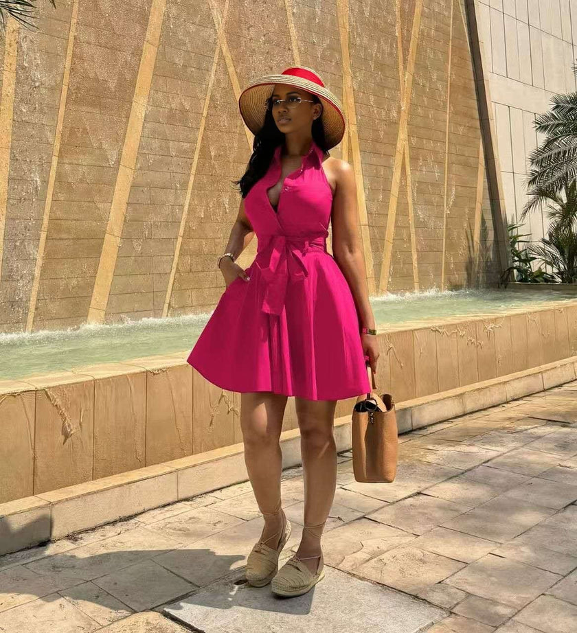 Hot-pink sleeveless A-line dress with tie waist and flared skirt