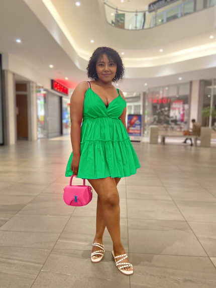 Green ruffle V-neck mini dress with adjustable spaghetti straps