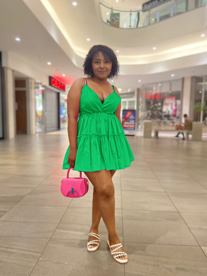 Green ruffle V-neck mini dress with adjustable spaghetti straps