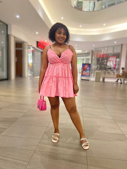 Pink ruffle V-neck mini dress with adjustable spaghetti straps