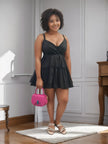 Black ruffle V-neck mini dress with adjustable spaghetti straps