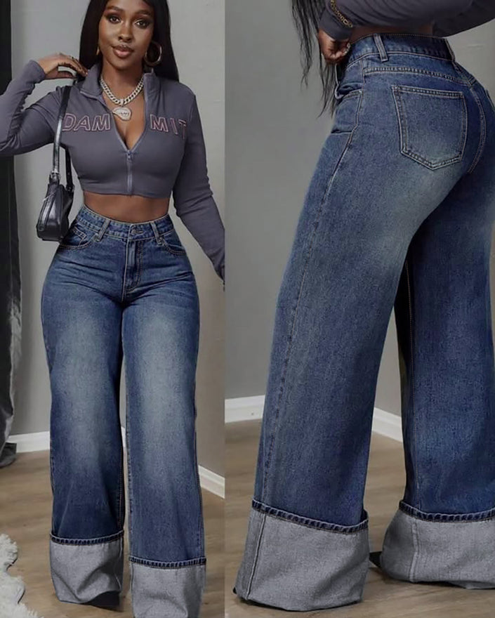 High-waist wide-leg jeans with cuffed hem, dark blue wash and visible stitching