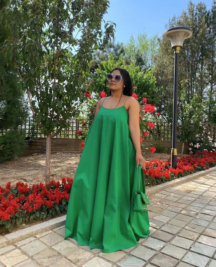 Green maxi dress with spaghetti straps and adjustable fit
