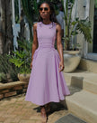Light-purple sleeveless midi dress with ruched waist and side tie