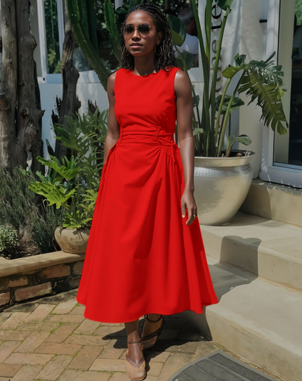 Red sleeveless midi dress with ruched waist and adjustable side tie
