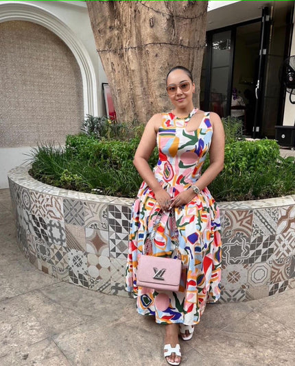 Women's sleeveless A-line midi dress with colorful abstract print and scoop neckline