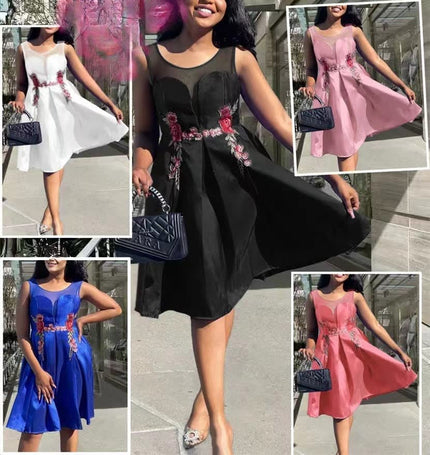Floral embroidered sleeveless dress with gathered skirt and flared hem
