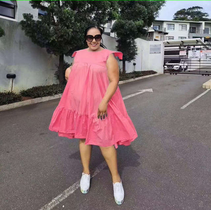 Pink sleeveless A-line dress with ruffle hem and tiered skirt
