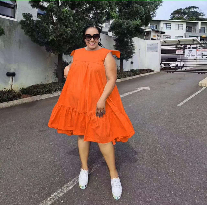 Orange sleeveless A-line dress with ruffle hem and tiered skirt