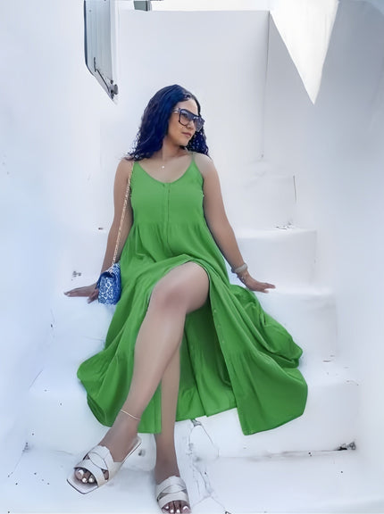 Green sleeveless A-line dress with V-neck and tiered skirt