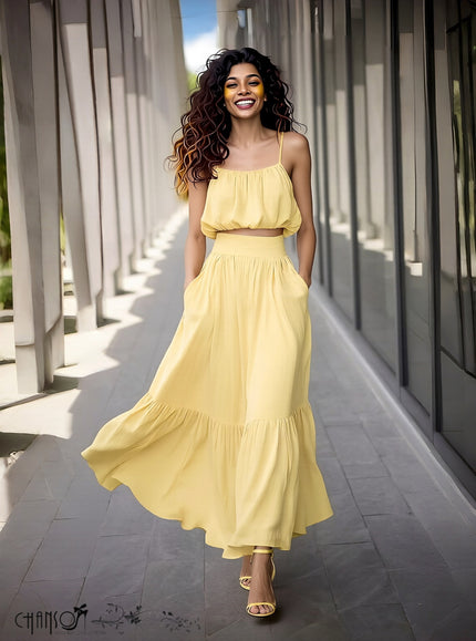 Yellow spaghetti-strap crop top with ruffled tiers and matching maxi skirt