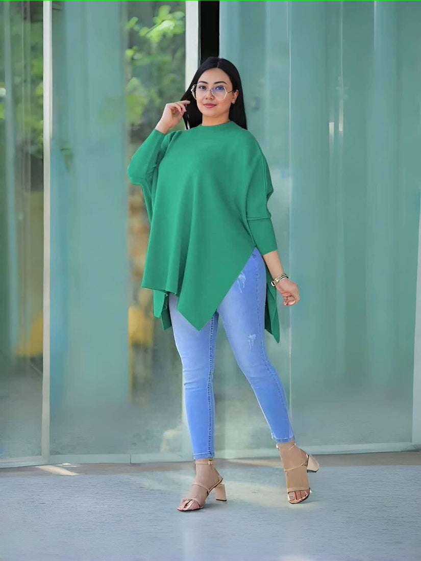 Dark-green loose knit top with asymmetrical hem and elbow-length sleeves