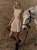 Peach sleeveless A-line mini dress with round neckline and flared skirt