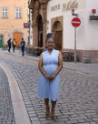 Sleeveless midi utility dress, light blue with front seams and pockets