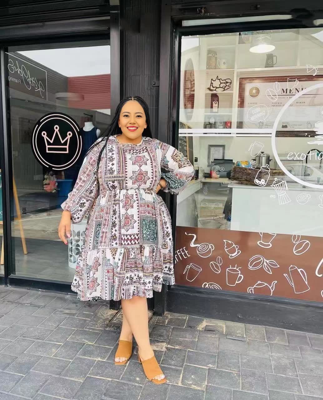 White printed midi dress with long sleeves and flared skirt, plus-size