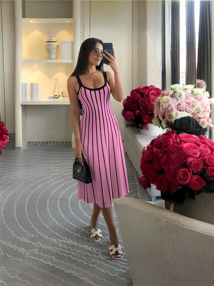 Striped knit midi dress with black vertical stripes on pink, sleeveless scoop neck