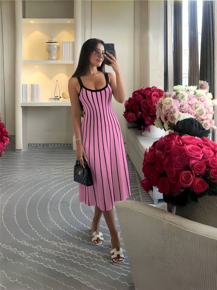 Striped knit midi dress with black vertical stripes on pink, sleeveless scoop neck