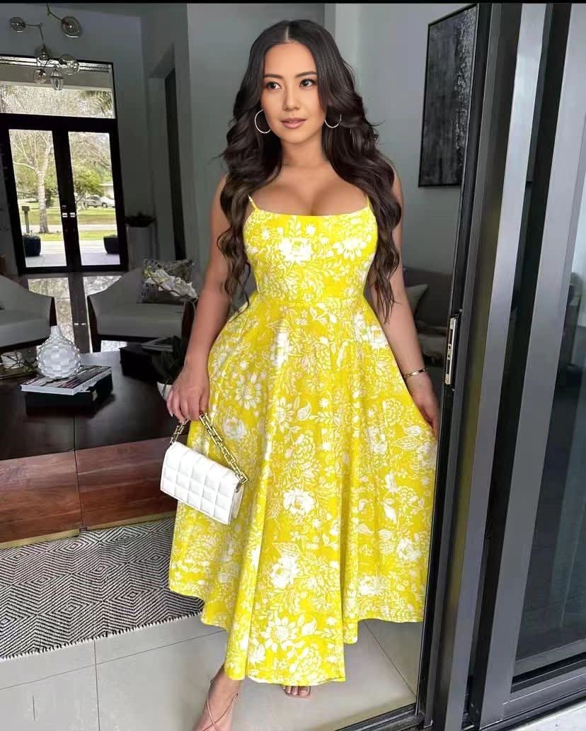 Yellow floral midi dress with sweetheart neckline, spaghetti straps, gathered skirt