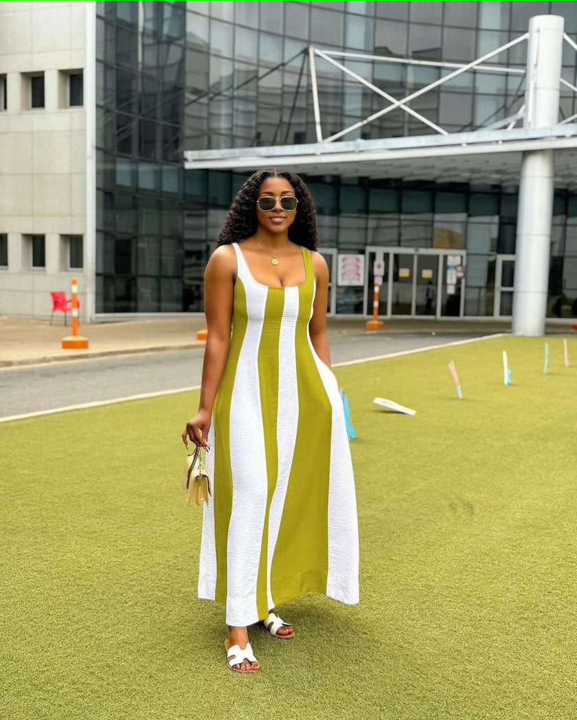 Sleeveless maxi dress with white vertical stripes over green paneling, wide scoop neck
