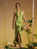 Green halter maxi dress with ruffle hem and rosette detail