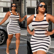 Sleeveless striped knit bodycon dress with scoop neckline, black and white horizontal stripes.
