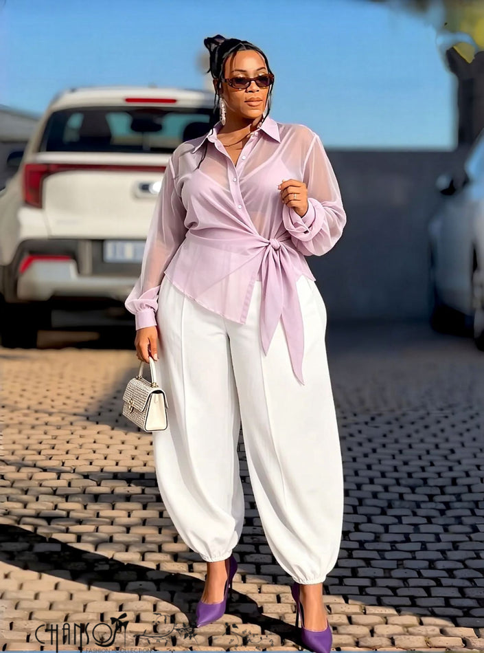 Light lavender wrap-front collared long-sleeve shirt with waist tie and button placket