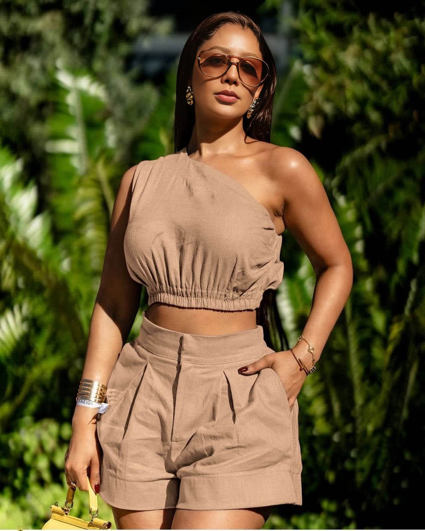 Nude beige off-shoulder smocked crop top with matching pleated shorts set