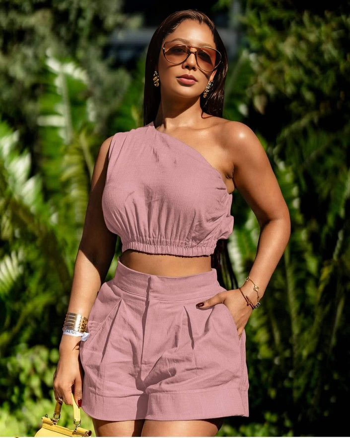 Peach off-shoulder smocked crop top with matching pleated shorts set