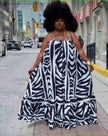 Plus size maxi dress with black-and-white animal stripe print, ruffle trim, spaghetti straps