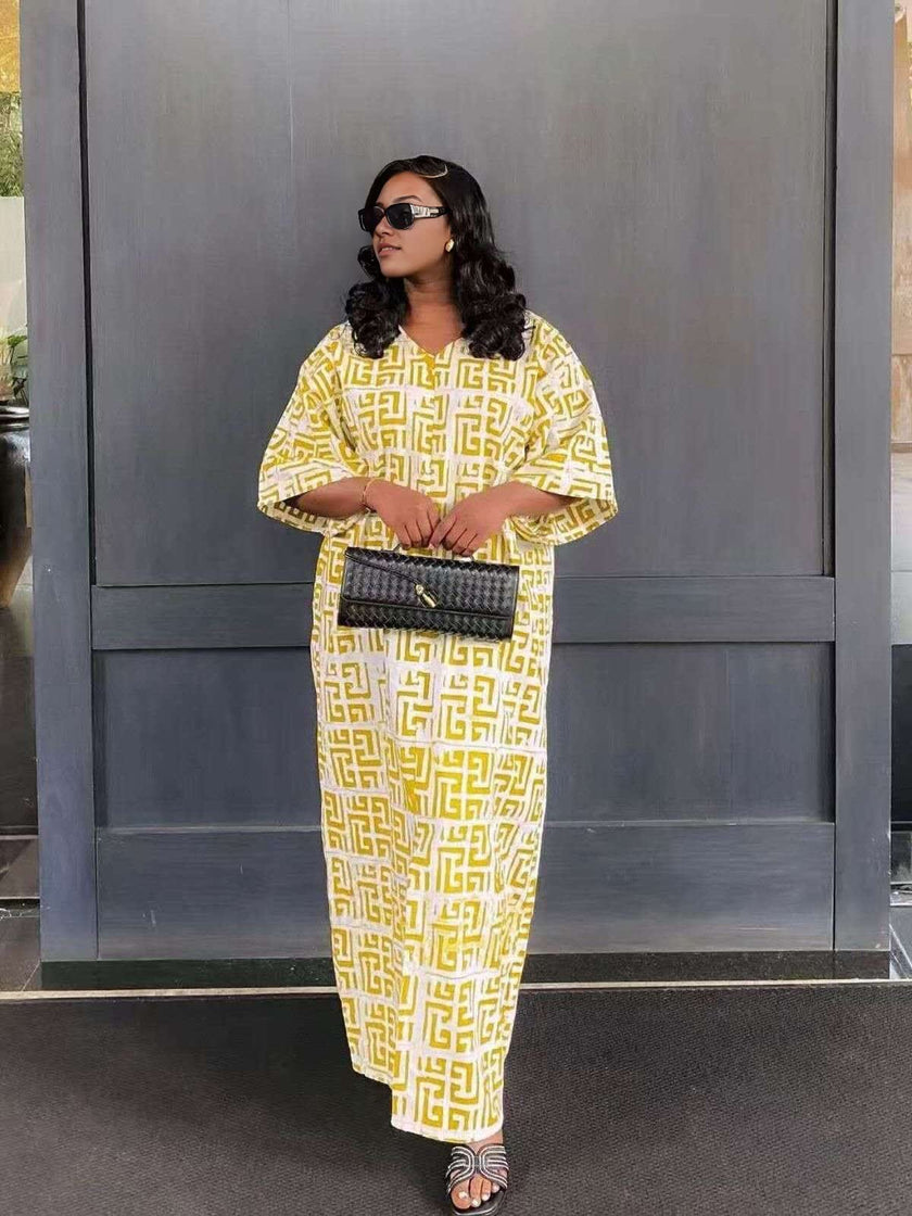Maxi dress with geometric pattern, loose fit, three-quarter sleeves, yellow base