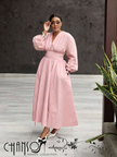 V-neck midi dress in pale pink with puff sleeves and cinched waist, gathered skirt