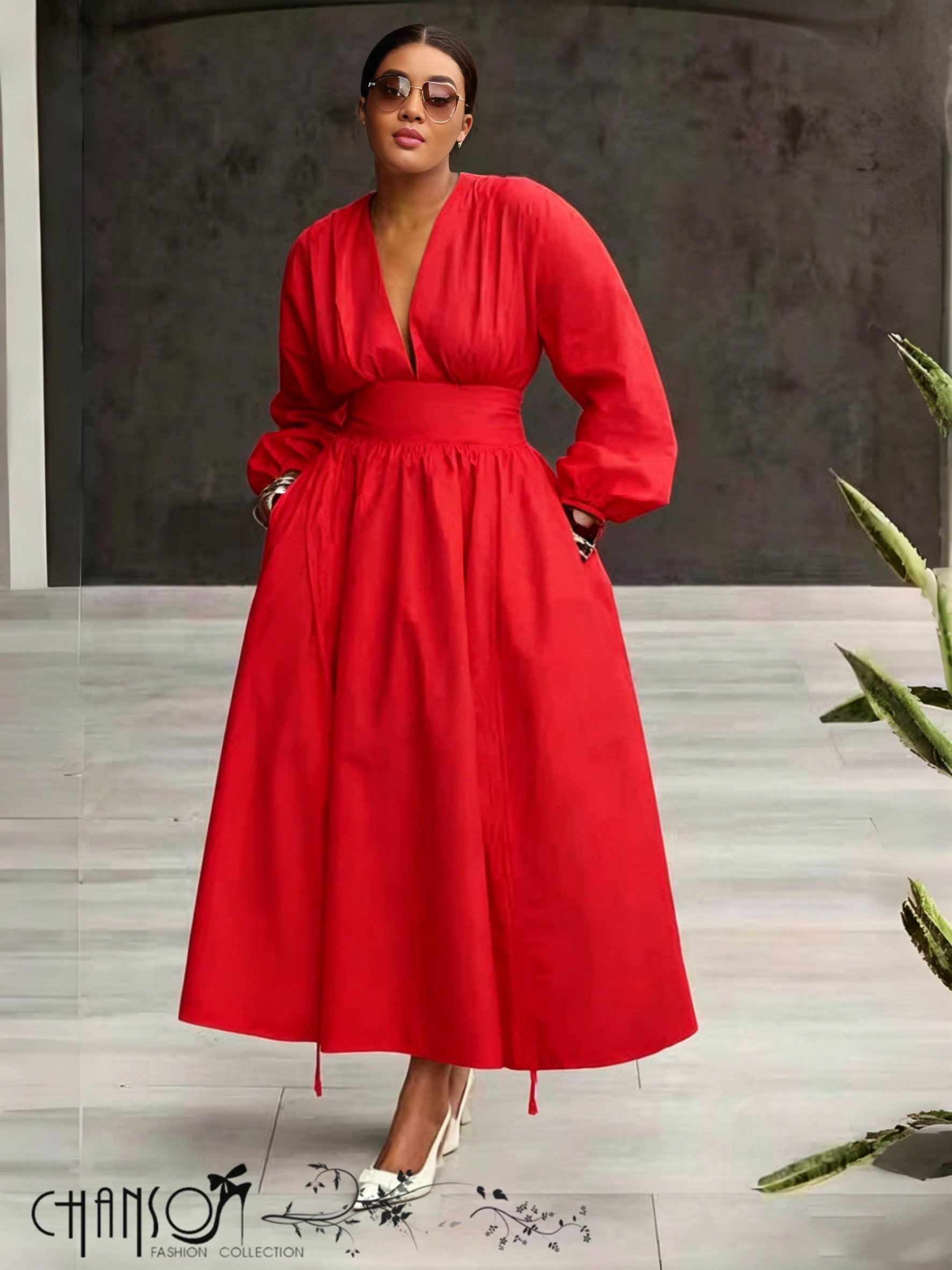 V-neck midi dress in red with puff sleeves and cinched waist, gathered midi skirt