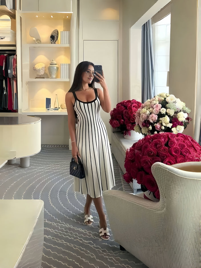 Sleeveless midi dress with vertical black-and-white stripes, square scoop neckline