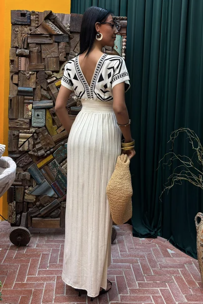 Cream knit maxi dress with black geometric V yoke and short sleeves