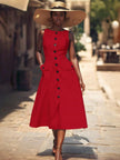 Red sleeveless midi dress with button front and side flap pockets, flared skirt