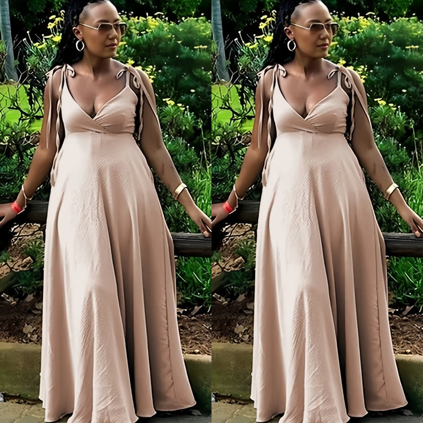 Peach maxi dress with tie shoulder straps and deep V-neck, adjustable fit