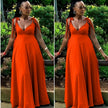 Orange-red maxi dress with tie shoulder straps and deep V-neck, adjustable fit