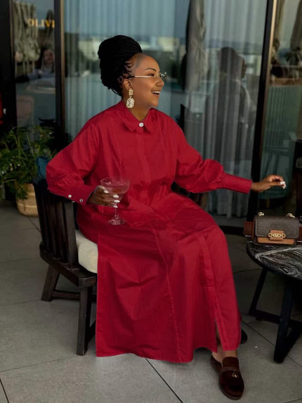 Red loose-fit maxi shirt dress with collar, long sleeves, and side patch pockets