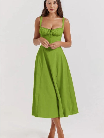 Green midi dress with spaghetti straps, cinched waist, flared midi skirt