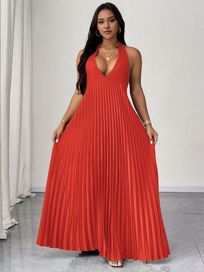 Red halter V-neck pleated maxi dress with pleated bodice and long skirt
