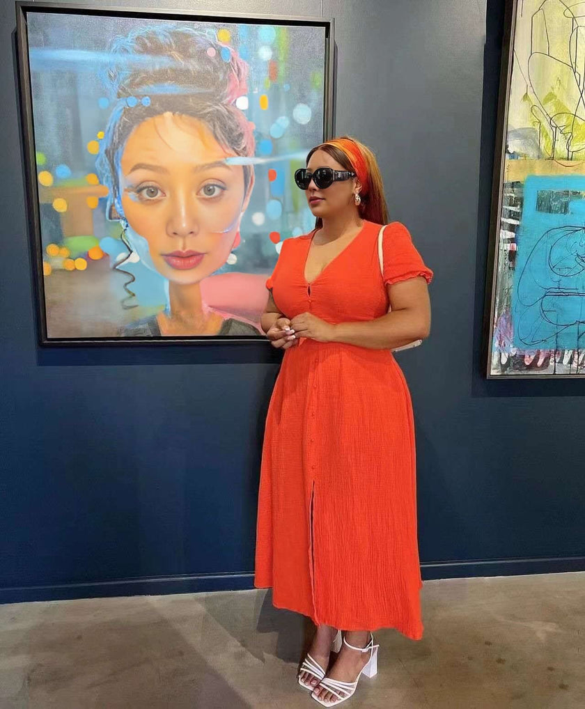 Orange-red button-down short-sleeve midi dress with V-neck and button front