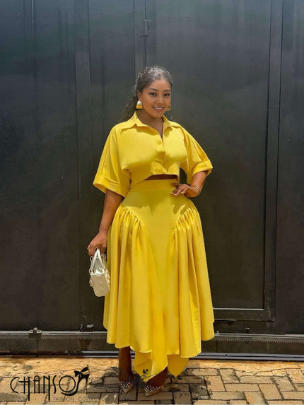 Yellow midi dress with cropped short-sleeve blouse and voluminous gathered asymmetric skirt