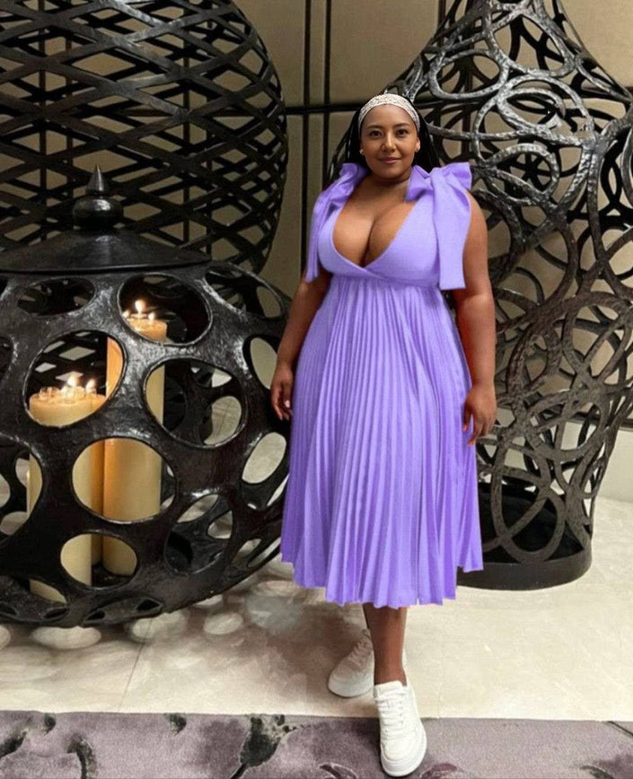 Light purple pleated midi dress with V-neckline and gathered bodice, sleeveless