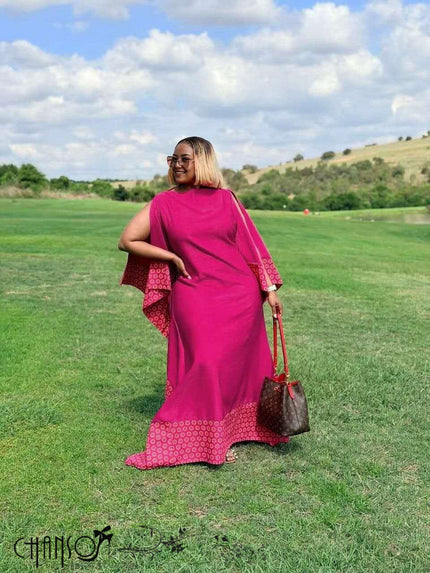 Fuchsia maxi dress with flare sleeves and patchwork hem detail