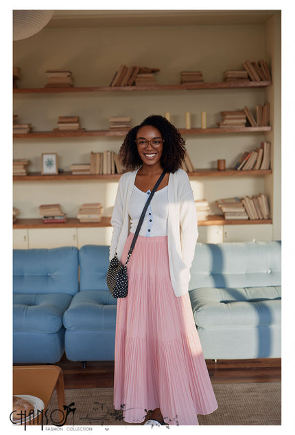 Tiered pleated maxi skirt in blush pink with flared tiered hem